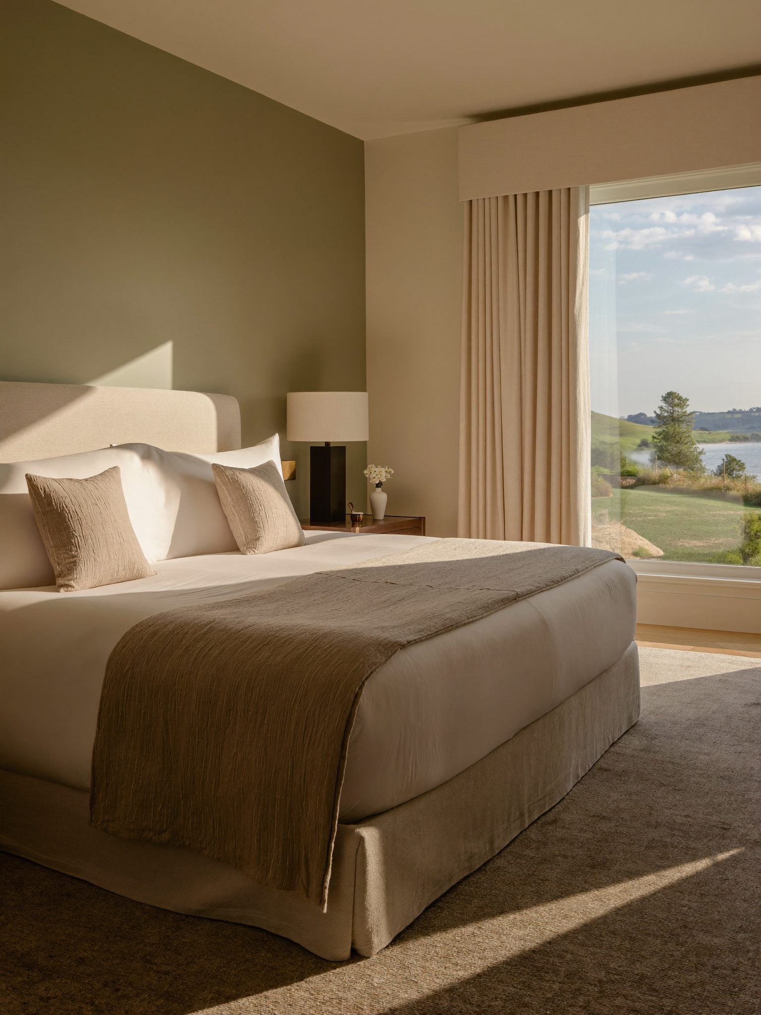Guest bedroom at Jorvellin lit by soft morning light