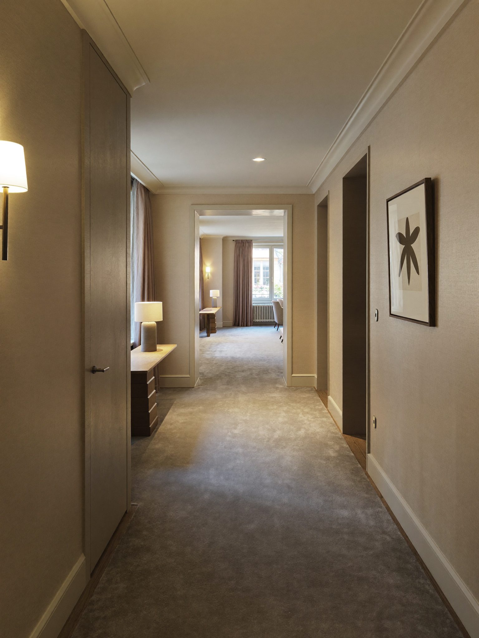 Ambient corridor lighting leading to guest rooms